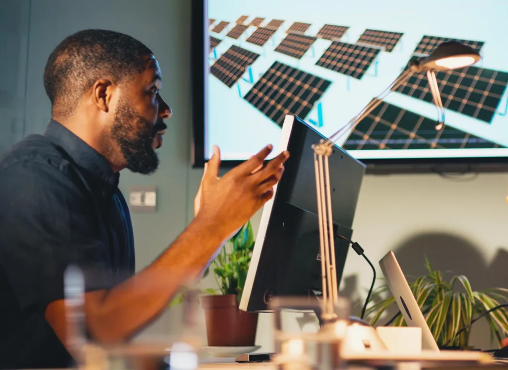 A man consulting on a sustainability project in an office